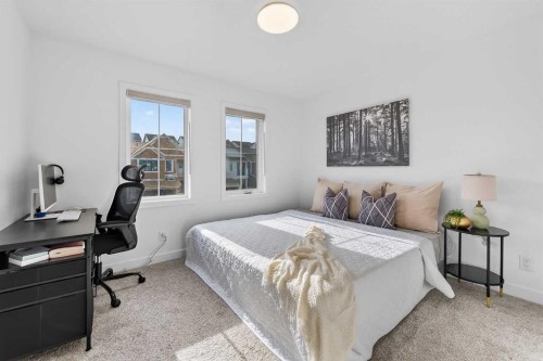 309 Baneberry Way Sw, Airdrie, AB - Indoor Photo Showing Bedroom