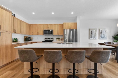 309 Baneberry Way Sw, Airdrie, AB - Indoor Photo Showing Kitchen With Stainless Steel Kitchen