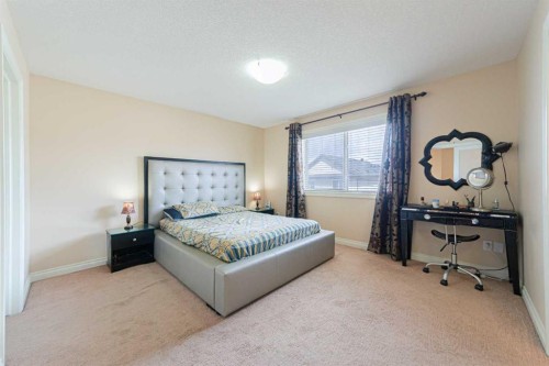 220 Saddlelake Drive Ne, Calgary, AB - Indoor Photo Showing Bedroom