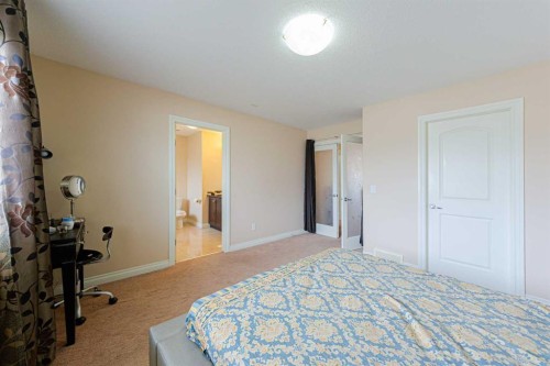 220 Saddlelake Drive Ne, Calgary, AB - Indoor Photo Showing Bedroom