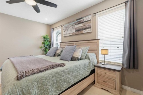 213 Silverado Drive Sw, Calgary, AB - Indoor Photo Showing Bedroom
