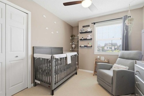213 Silverado Drive Sw, Calgary, AB - Indoor Photo Showing Bedroom