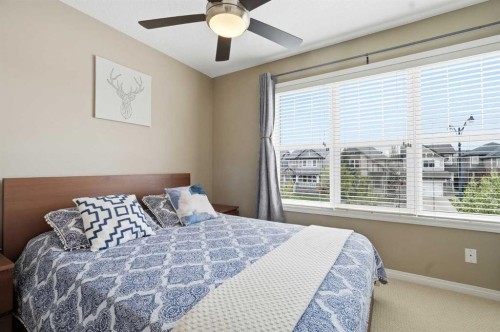 213 Silverado Drive Sw, Calgary, AB - Indoor Photo Showing Bedroom