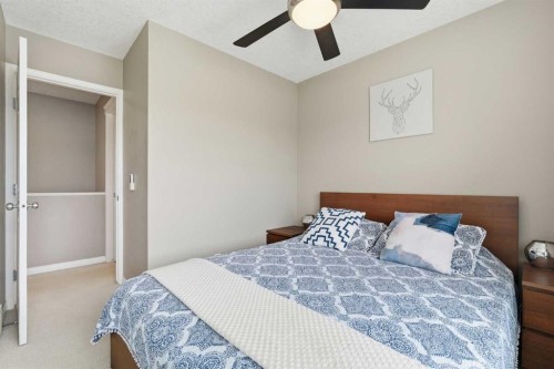 213 Silverado Drive Sw, Calgary, AB - Indoor Photo Showing Bedroom