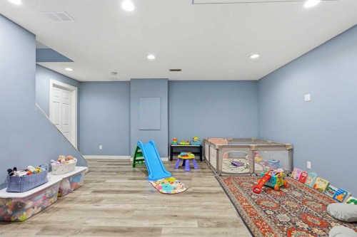 213 Silverado Drive Sw, Calgary, AB - Indoor Photo Showing Other Room