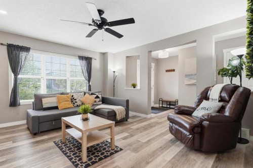 213 Silverado Drive Sw, Calgary, AB - Indoor Photo Showing Living Room