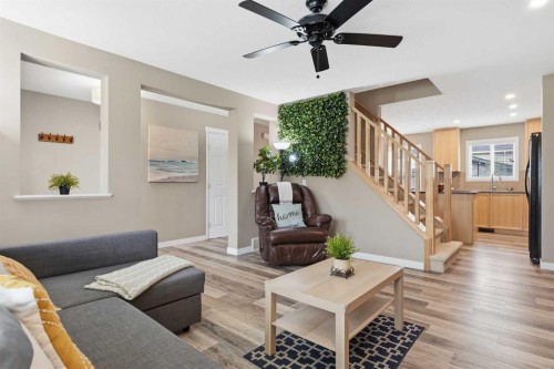 213 Silverado Drive Sw, Calgary, AB - Indoor Photo Showing Living Room