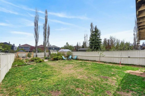 44 Bridlepost Green Sw, Calgary, AB - Outdoor With Backyard