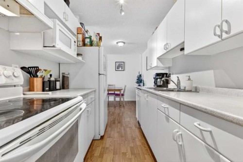 11D-80 Galbraith Drive Sw, Calgary, AB - Indoor Photo Showing Kitchen