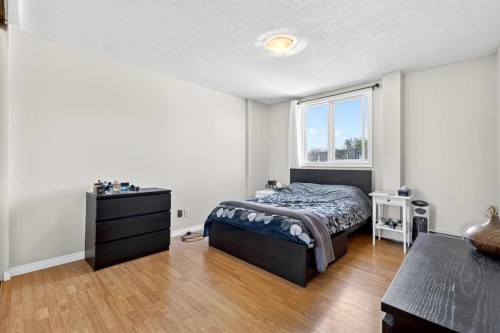 11D-80 Galbraith Drive Sw, Calgary, AB - Indoor Photo Showing Bedroom