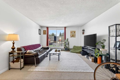 11D-80 Galbraith Drive Sw, Calgary, AB - Indoor Photo Showing Living Room