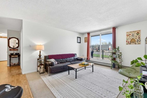 11D-80 Galbraith Drive Sw, Calgary, AB - Indoor Photo Showing Living Room