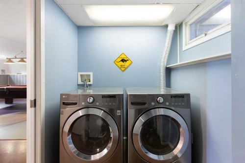 10811 Maplecrest Road Se, Calgary, AB - Indoor Photo Showing Laundry Room