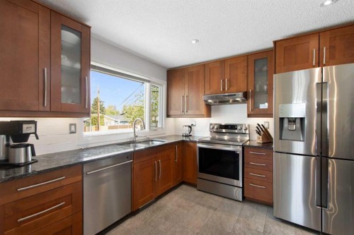 10811 Maplecrest Road Se, Calgary, AB - Indoor Photo Showing Kitchen With Stainless Steel Kitchen