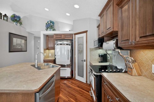 112 Prestwick Point Se, Calgary, AB - Indoor Photo Showing Kitchen With Double Sink With Upgraded Kitchen