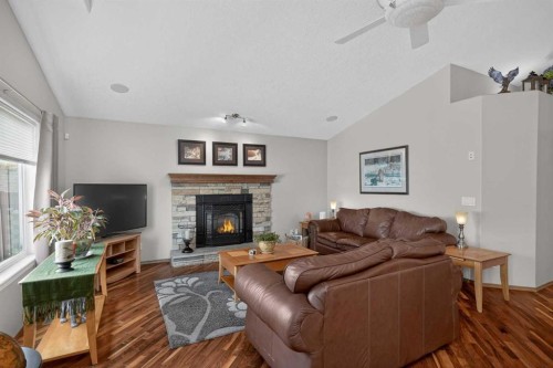 112 Prestwick Point Se, Calgary, AB - Indoor Photo Showing Living Room With Fireplace
