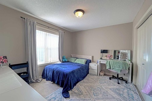 247 Pantego Way Nw, Calgary, AB - Indoor Photo Showing Bedroom