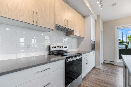 117-238 Sage Valley Common Nw, Calgary, AB - Indoor Photo Showing Kitchen With Upgraded Kitchen