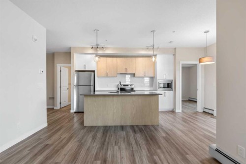 117-238 Sage Valley Common Nw, Calgary, AB - Indoor Photo Showing Kitchen With Upgraded Kitchen