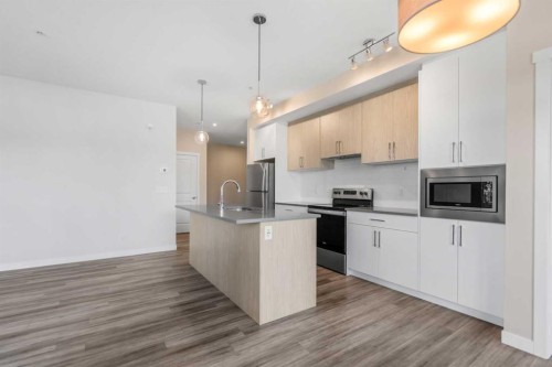117-238 Sage Valley Common Nw, Calgary, AB - Indoor Photo Showing Kitchen With Upgraded Kitchen