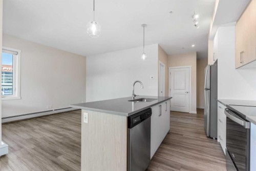 117-238 Sage Valley Common Nw, Calgary, AB - Indoor Photo Showing Kitchen With Upgraded Kitchen