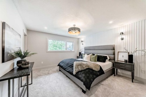 1115 Lake Wapta Road Se, Calgary, AB - Indoor Photo Showing Bedroom
