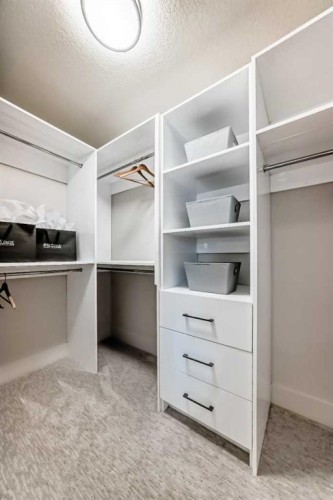 1115 Lake Wapta Road Se, Calgary, AB - Indoor With Storage