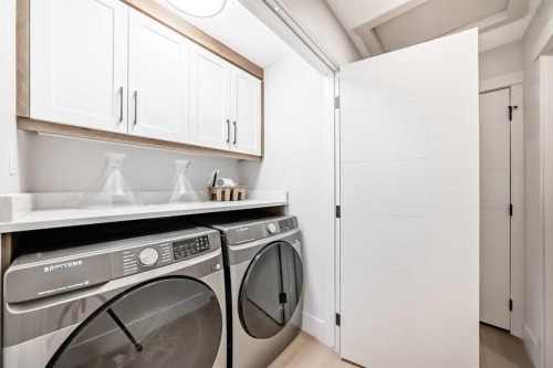 1115 Lake Wapta Road Se, Calgary, AB - Indoor Photo Showing Laundry Room
