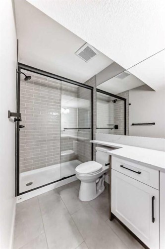 1115 Lake Wapta Road Se, Calgary, AB - Indoor Photo Showing Bathroom