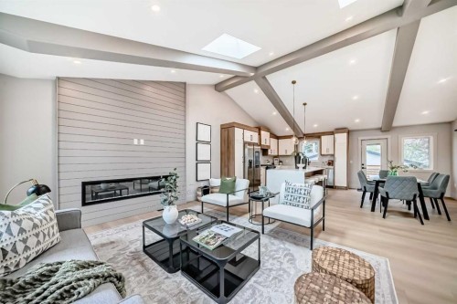 1115 Lake Wapta Road Se, Calgary, AB - Indoor Photo Showing Living Room With Fireplace