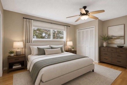 404 Canterbury Drive Sw, Calgary, AB - Indoor Photo Showing Bedroom