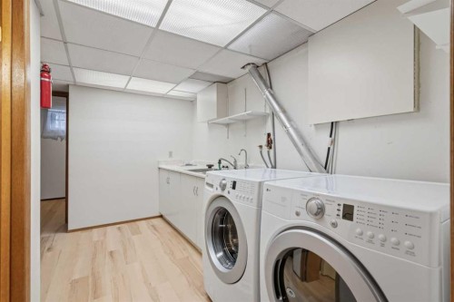 404 Canterbury Drive Sw, Calgary, AB - Indoor Photo Showing Laundry Room