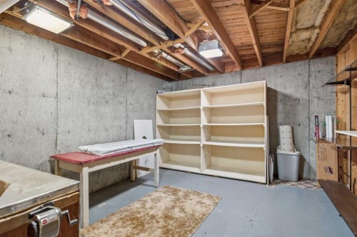 404 Canterbury Drive Sw, Calgary, AB - Indoor Photo Showing Basement