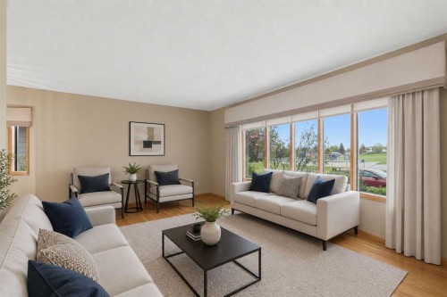 404 Canterbury Drive Sw, Calgary, AB - Indoor Photo Showing Living Room