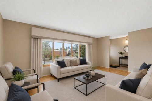 404 Canterbury Drive Sw, Calgary, AB - Indoor Photo Showing Living Room