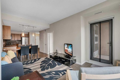 904-211 13 Avenue Se, Calgary, AB - Indoor Photo Showing Living Room