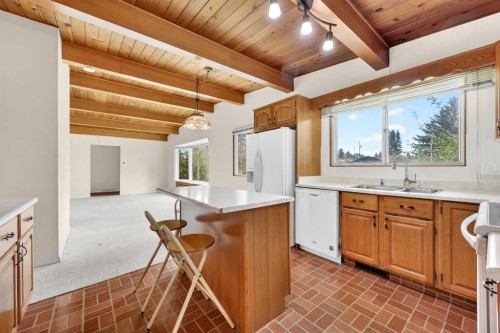 920 87 Avenue Sw, Calgary, AB - Indoor Photo Showing Kitchen With Double Sink