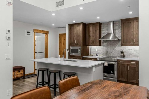 310B-1012 Spring Creek Drive West, Canmore, AB - Indoor Photo Showing Kitchen With Upgraded Kitchen