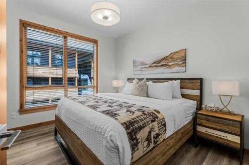 310B-1012 Spring Creek Drive West, Canmore, AB - Indoor Photo Showing Bedroom