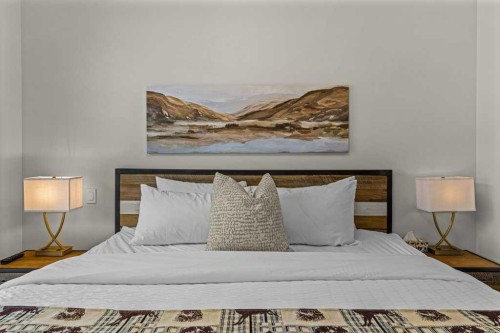 310B-1012 Spring Creek Drive West, Canmore, AB - Indoor Photo Showing Bedroom