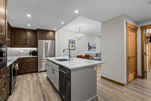 310B-1012 Spring Creek Drive West, Canmore, AB - Indoor Photo Showing Kitchen With Stainless Steel Kitchen With Upgraded Kitchen