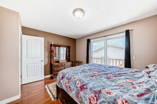 52 Beacham Road Nw, Calgary, AB - Indoor Photo Showing Bedroom