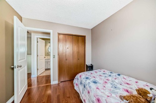 52 Beacham Road Nw, Calgary, AB - Indoor Photo Showing Bedroom