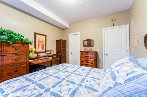 206-8 Prestwick Pond Terrace Se, Calgary, AB - Indoor Photo Showing Bedroom