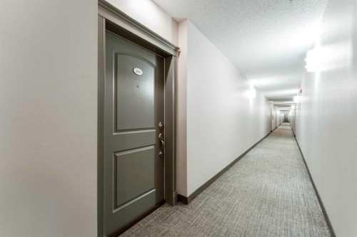 206-8 Prestwick Pond Terrace Se, Calgary, AB - Indoor Photo Showing Other Room
