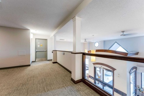 206-8 Prestwick Pond Terrace Se, Calgary, AB - Indoor Photo Showing Other Room
