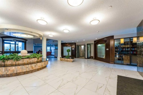 206-8 Prestwick Pond Terrace Se, Calgary, AB - Indoor Photo Showing Other Room