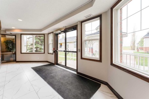 206-8 Prestwick Pond Terrace Se, Calgary, AB - Indoor Photo Showing Other Room