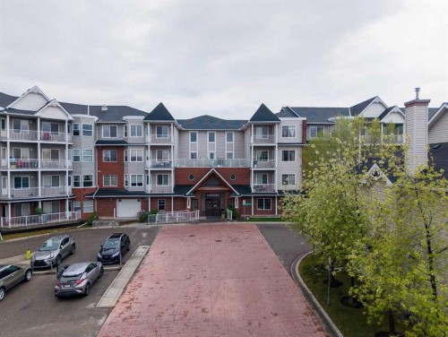 206-8 Prestwick Pond Terrace Se, Calgary, AB - Outdoor With Balcony With Facade