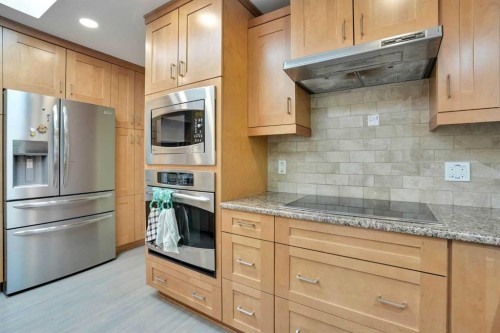 2704 Chandler Road Nw, Calgary, AB - Indoor Photo Showing Kitchen With Stainless Steel Kitchen